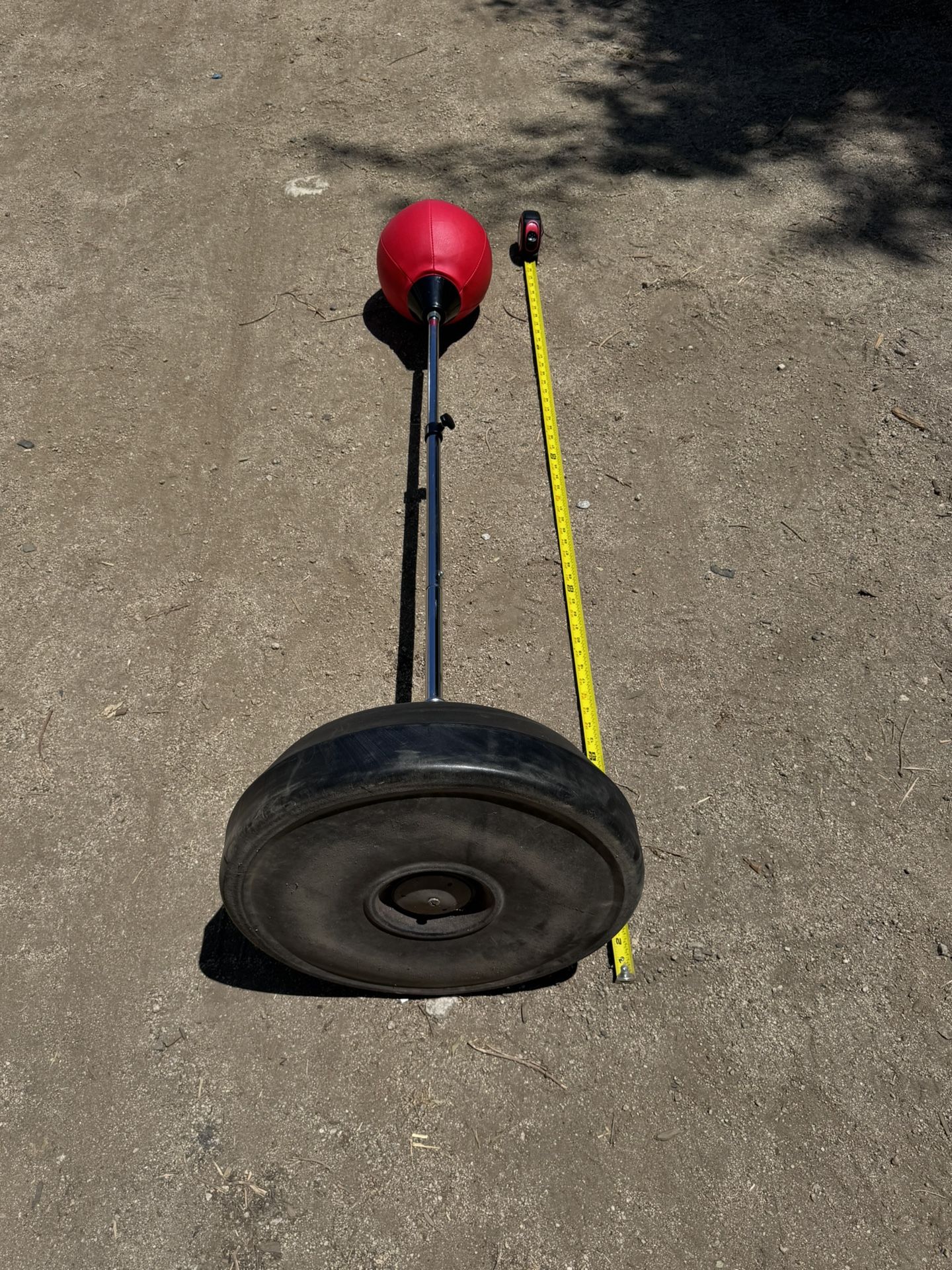 Adjustable reflex punching bag