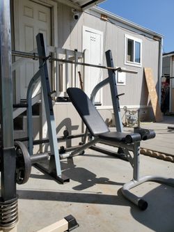Selling home gym olympic bench press And  a multi-function cable gym machine