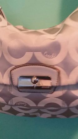Coach authentic silver purse. .med size..like new!