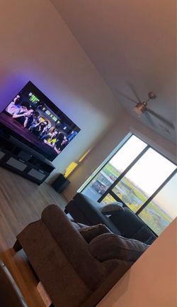 *Gray sectional couch with Storage ottoman*