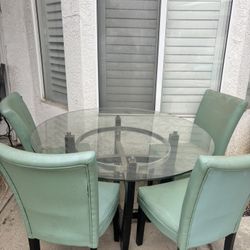 Glass And Wood Dining Table W/ Teal Pleather Chairs