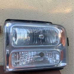 F-250 / F-350 Ford Excursion left front headlight Oem