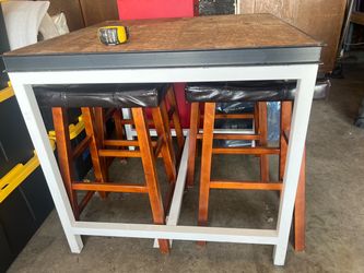 Table & 4 wood stools $50