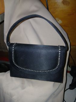Black clutch with beaded flap