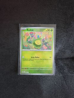 Budew Master ball pattern from prismatic evolution Pokémon card