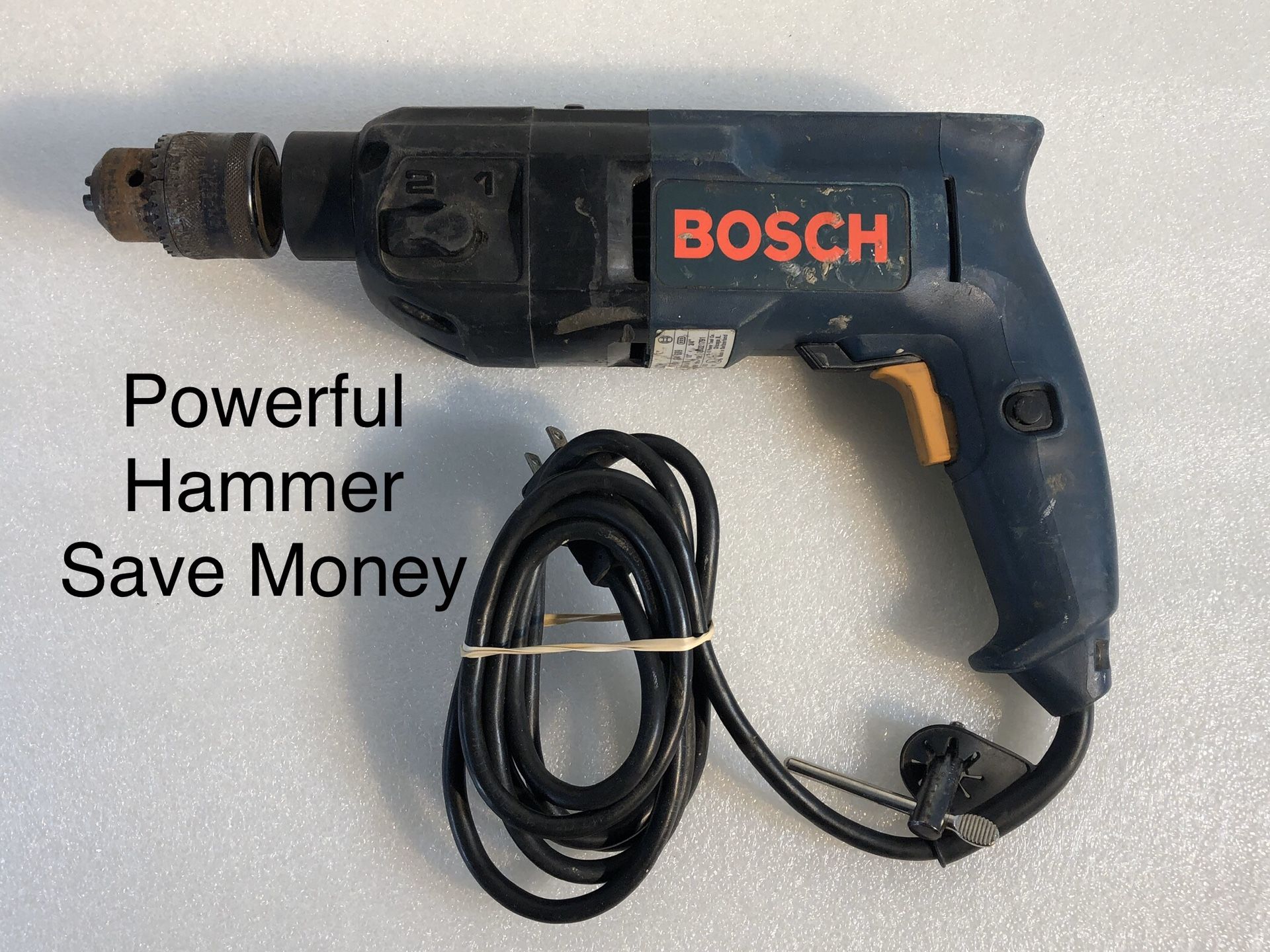 Bosh 7 Amp Corded 1/2 in. Concrete/Masonry Variable Speed Hammer Drill Kit - Works Great