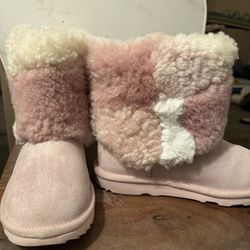Pink UGG boot Size 4