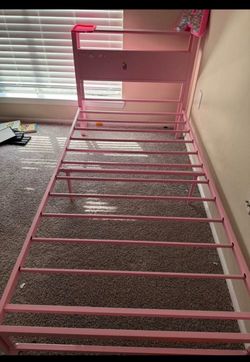 Girls pink bed frame will come with mattress if u want it.