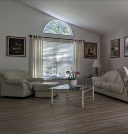 Natucci/ sofa / chairs and two tables /ottoman.