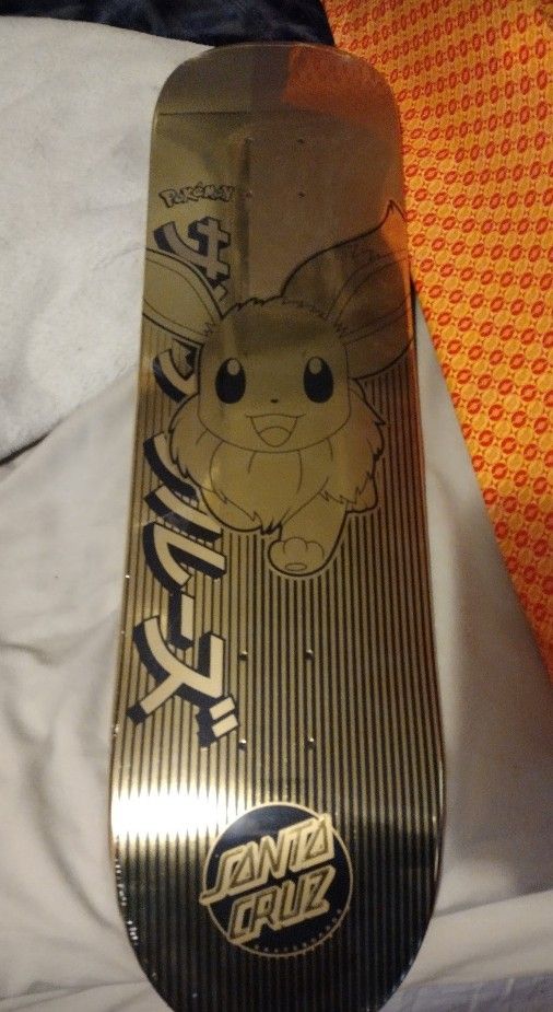 Gold Eevee Santa Cruz Pokemon Skateboard