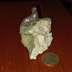 Unphotogenic Petwer Seal on All Natural Quartz Rock
