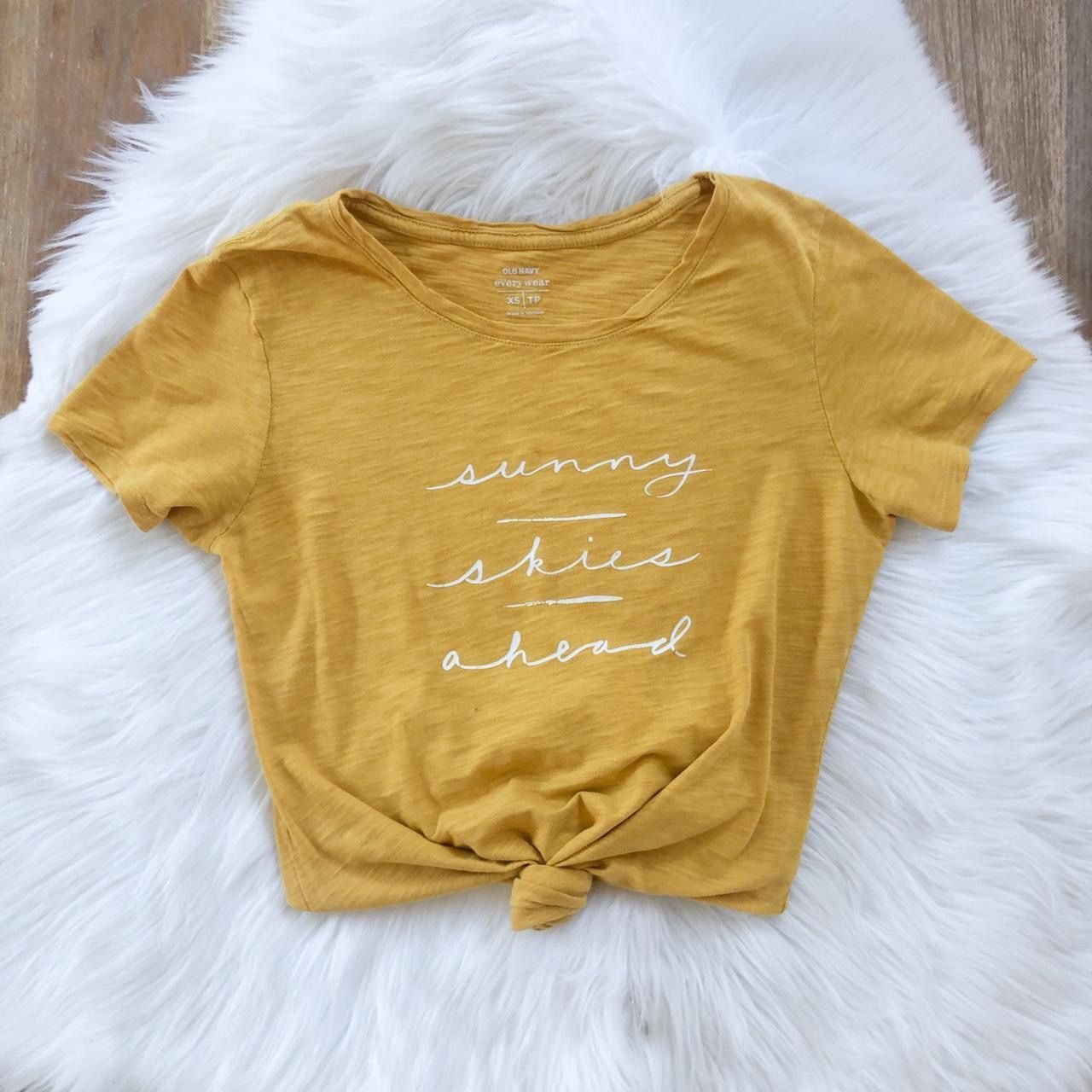 Old Navy yellow shirt, “sunny skies ahead”
