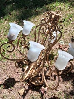 Gold Scrollwork Chandelier with Frosted Glass Shades