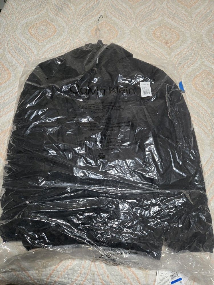 Brand New Calvin Klein Jacket With Sherpa Lined Hood