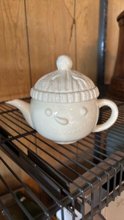 Adorable snow man head tea pot