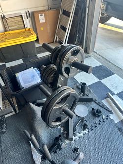 Olympic Weight Plates and Barbell Set