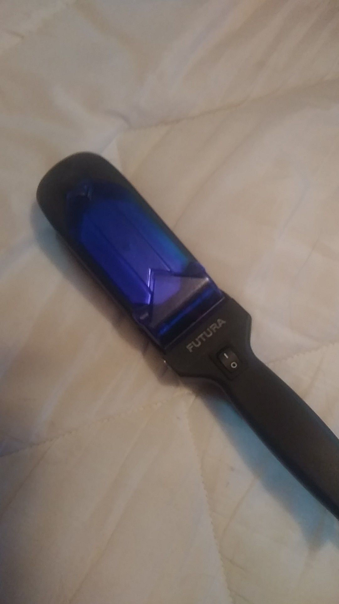 Futura Pro hair straightener by Metropolis.