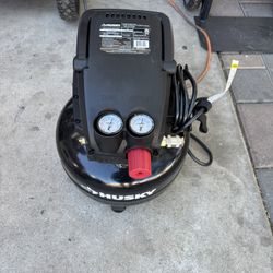Husky 3 Gal. 120 PSI Portable Electric Oil-Free Light Duty Pancake Air Compressor with Fold Down Handle and 1-Quick Coupler