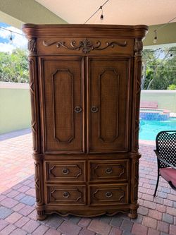 Large Vintage Wood Armoire with Carved Detail