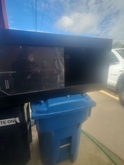 Large Black Flat Screen TV