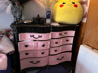 Pink and black dresser