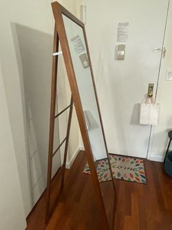 Full length mirror with rack