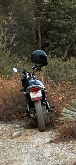 Black Motorcycle with Helmet