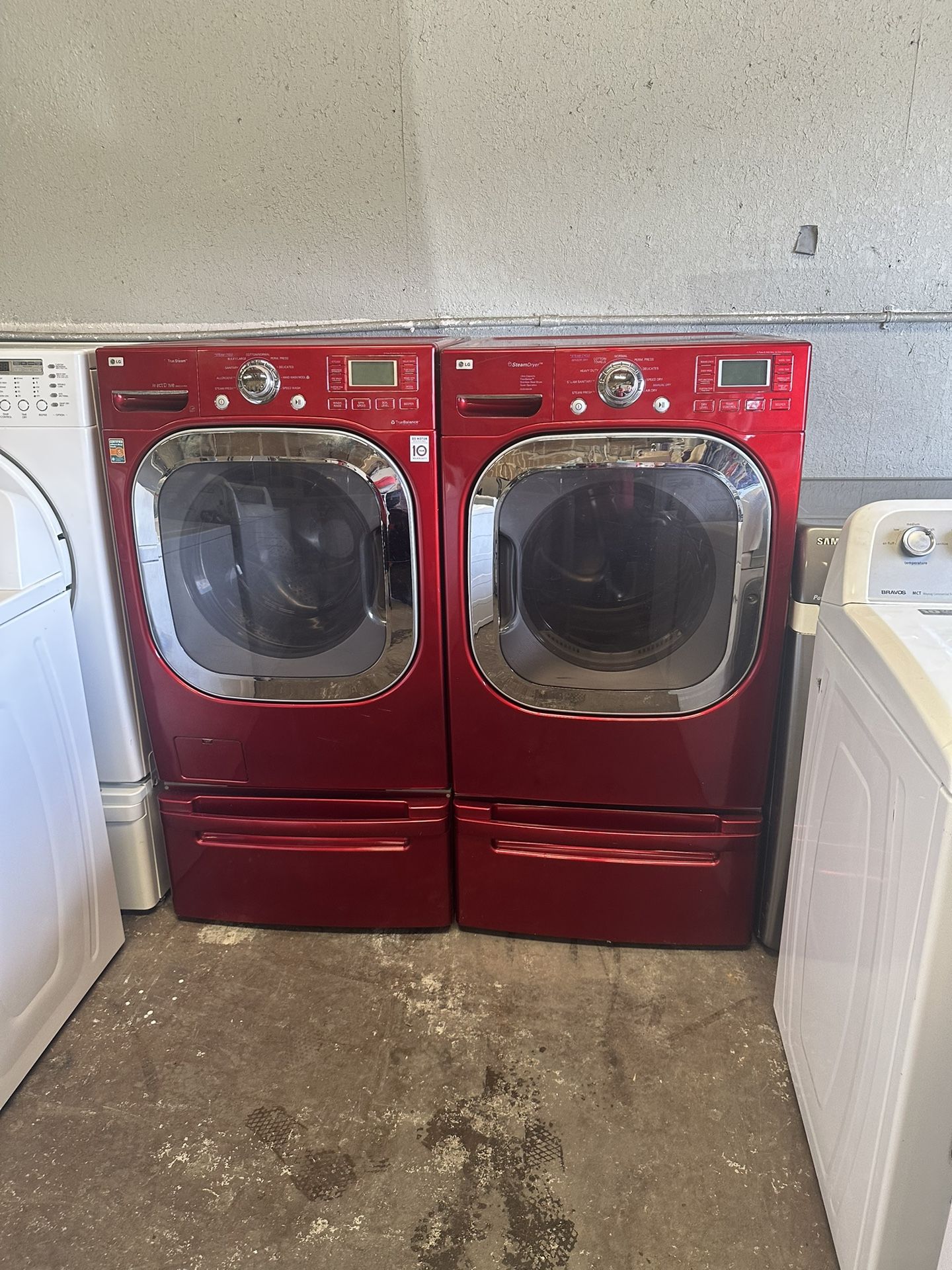 Red front load, LG washer and gas dryer on pedestals can deliver for Sale in West Sacramento, CA