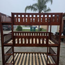 Triple twin wooden bunk bed. Comes with all Hardware and all pieces.