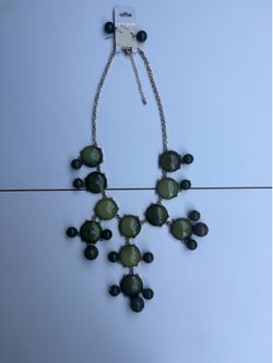 Gold tone green necklace