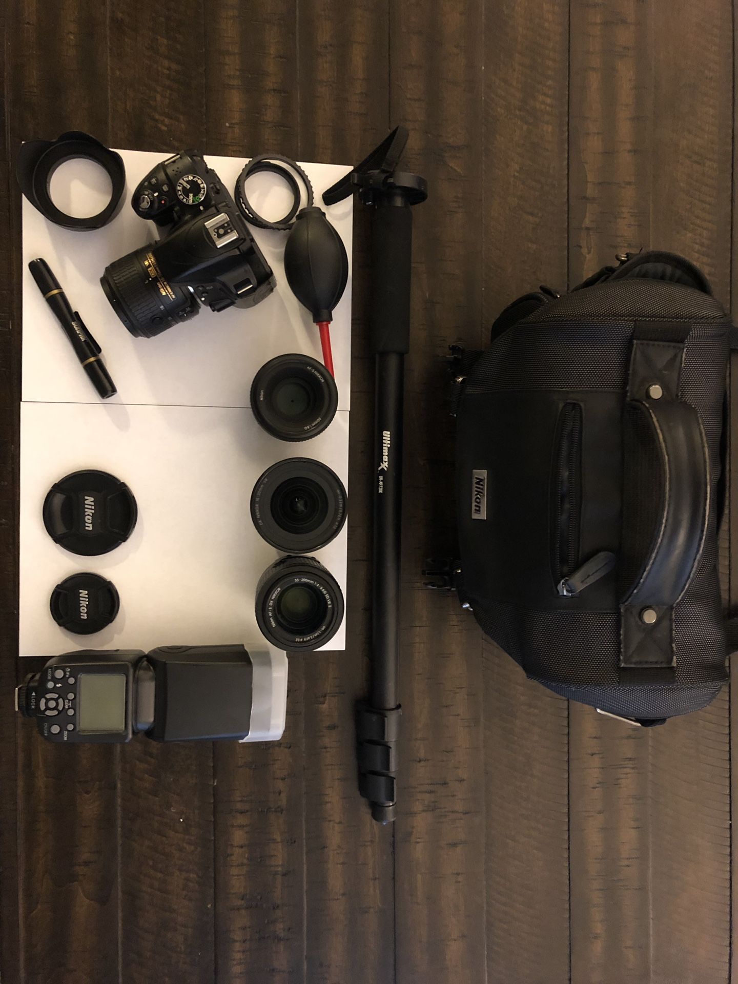 Nikon D3300 DSLR Camera plus 4 nice lenses, carrying case, monopod, charger, and memory card