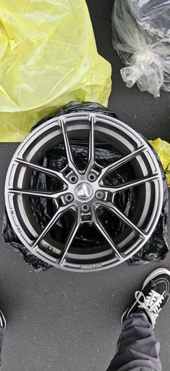 Makstton MST-713 aluminum alloy wheels featuring a multi-spoke design and a dark grey finish.