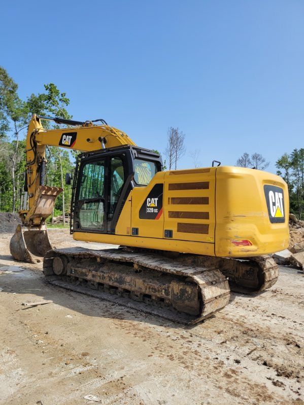 Excavator With Thumb