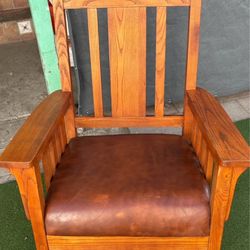 Antique oak and leather rocking chair