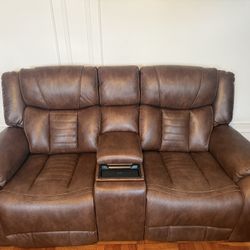 Leather Sofa, loveseat and Recliner  It’s a beautiful brown leather cushions set $2500 or BO.