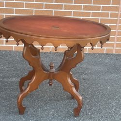 Antique Victorian Style Oval Top Parlor Table - Genuine Mahogany Imperfections. One leg was repaired at the bottom see last 3-4pics. Comes as pictured