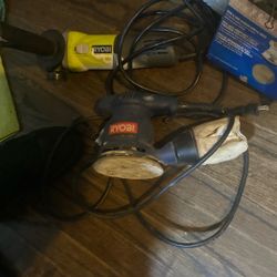Ryobi Angle Grinder And Ryobi Orbital Sander With A Box Of 220 Sandpaper 
