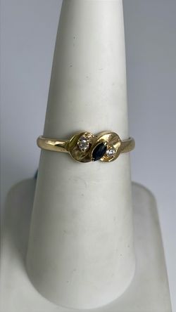 14k gold ring with dark and clear CZ