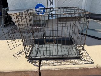 Black metal dog crate