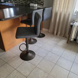3 Swival Chairs 