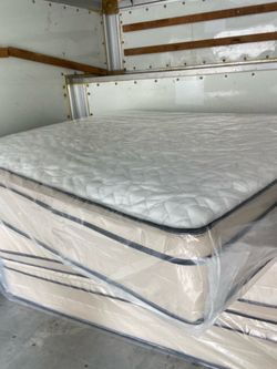 Queen Pillowtop Mattress and box spring new in plastic free delivery in Atlanta
