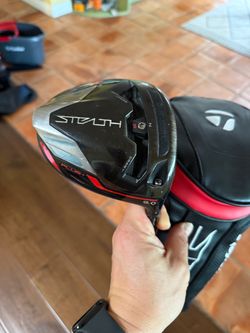Taylormade stealth plus driver with a cover