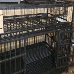 Heavy Duty Large Dog Cage. Very Well Kept Also A Metal Puppy Box. Dimensions  42.5 long  X 30"WIDE X 32 HIGH X 