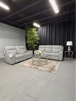 BRAND NEW! Gray Fabric Sofa/Loveseat from Ashley Furniture. DELIVERY AVAILABLE!