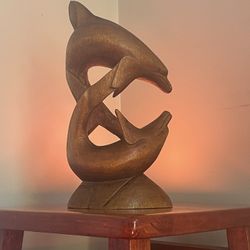 Dolphins Carved Wood. 