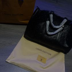 Louis Vuitton Duffle Bag