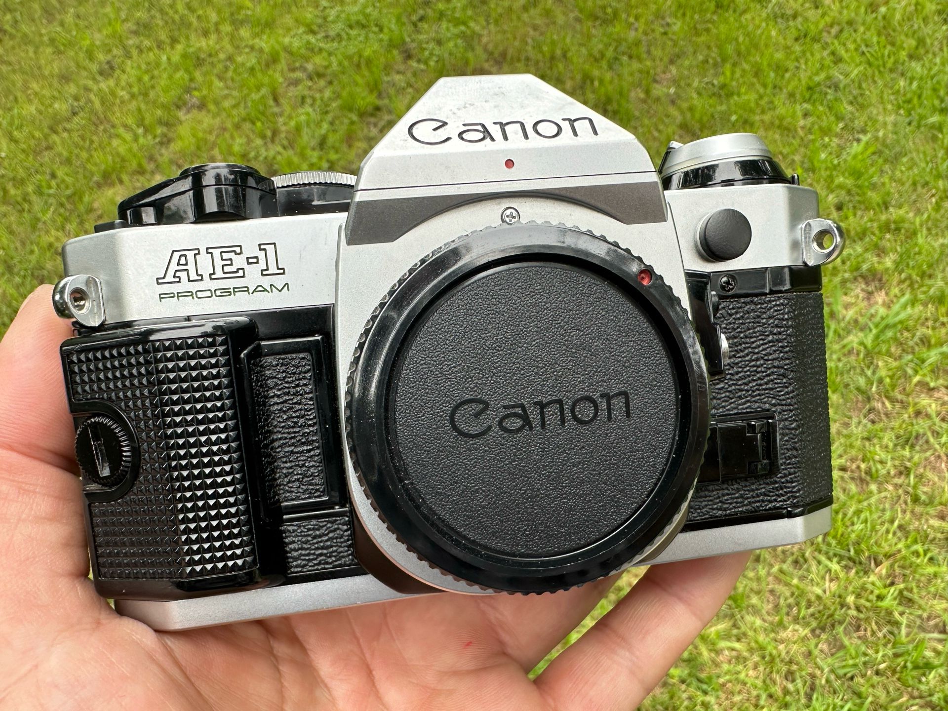 Canon AE-1 Program - body w fingergrip 35mm Film Camera