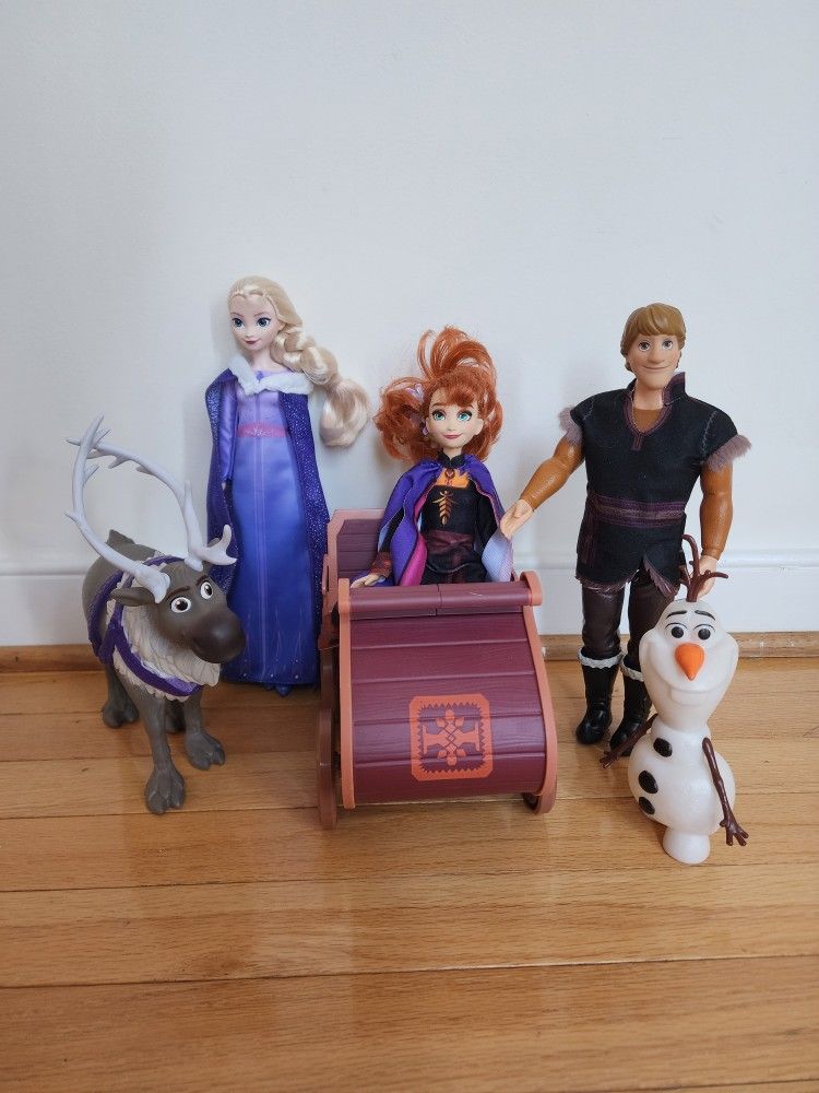 Frozen Sled And Dolls