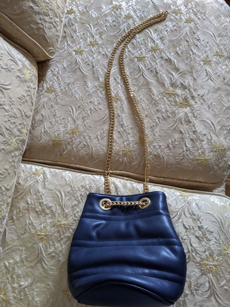 Blue purse with gold chain