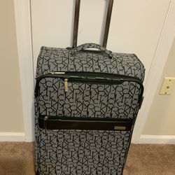 Calvin Klein Expandable Suitcase 25.5 inches High, 16 Wide, 10 Deep,  4 Wheels Lightweight 9.5 pounds,
